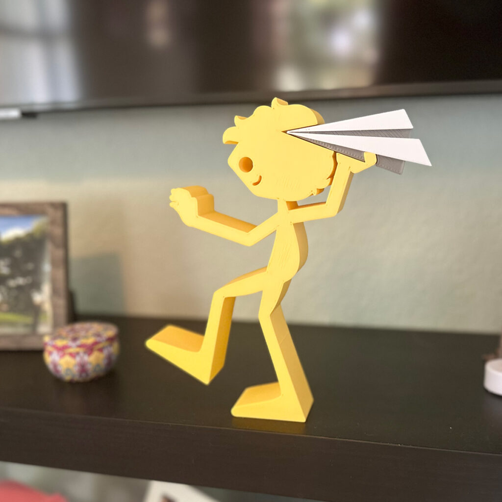 Boy Throwing Paper Airplane